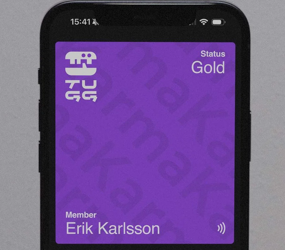 Ett medlemskort från Tugg med guldstatus i mobilens wallet